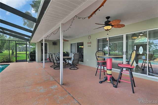 705 E Dakota Ct, Hernando, FL 34442 - view of patio / terrace featuring a ceiling fan, an outdoor pool, a lanai, and outdoor dining area