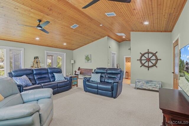 carpeted living room featuring french doors, vaulted ceiling, ceiling fan, and wooden ceiling