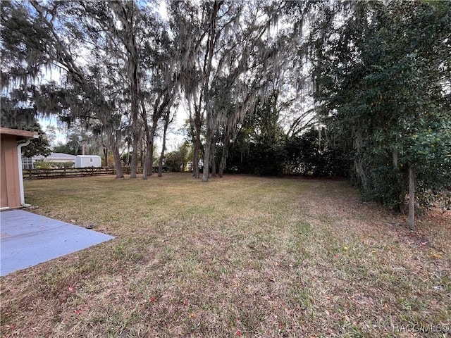 view of yard featuring fence