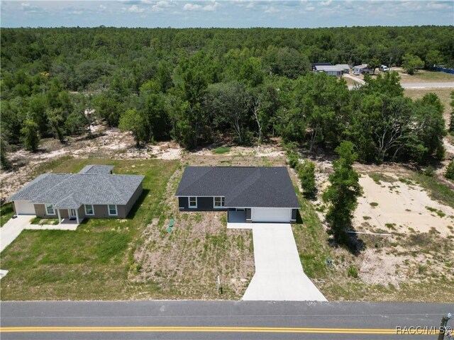 22777 SW Beach Blvd, Dunnellon, FL 34431 - aerial view of property and surrounding area featuring a forest