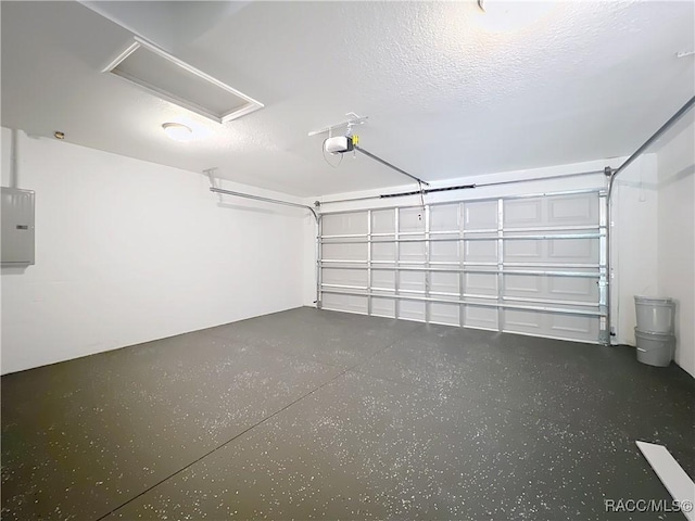 22777 SW Beach Blvd, Dunnellon, FL 34431 - garage with electric panel and a garage door opener