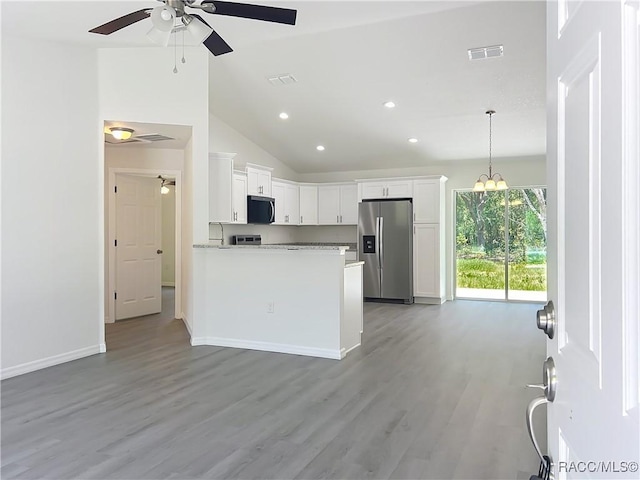 22777 SW Beach Blvd, Dunnellon, FL 34431 - kitchen featuring appliances with stainless steel finishes, ceiling fan, light wood-style flooring, recessed lighting, and white cabinets