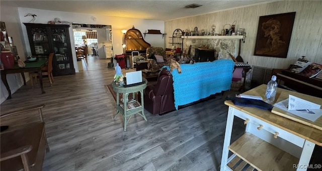 9616 E Gospel Island Rd, Inverness, FL 34450 - living area featuring wood finished floors and wooden walls