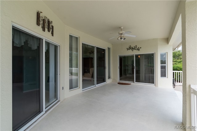 view of patio / terrace featuring ceiling fan