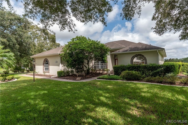 view of front of house with a front yard