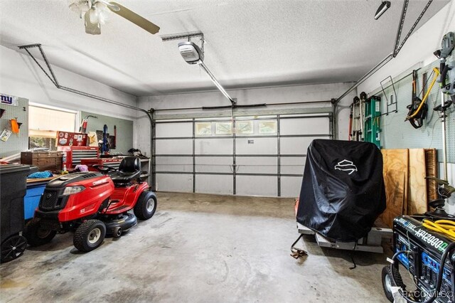 1420 E Silver Thorn Loop, Hernando, FL 34442 - garage with a garage door opener and a ceiling fan