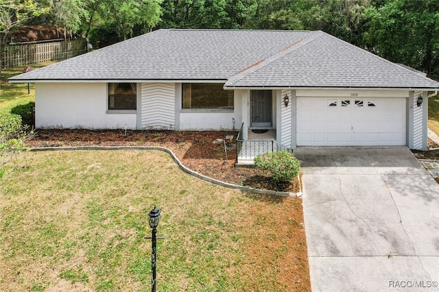 1420 E Silver Thorn Loop, Hernando, FL 34442 - single story home featuring roof with shingles, an attached garage, driveway, and stucco siding