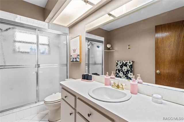 1420 E Silver Thorn Loop, Hernando, FL 34442 - full bath featuring toilet, vanity, a stall shower, and tile patterned flooring