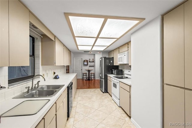 1420 E Silver Thorn Loop, Hernando, FL 34442 - kitchen featuring white appliances, cream cabinets, backsplash, and light countertops
