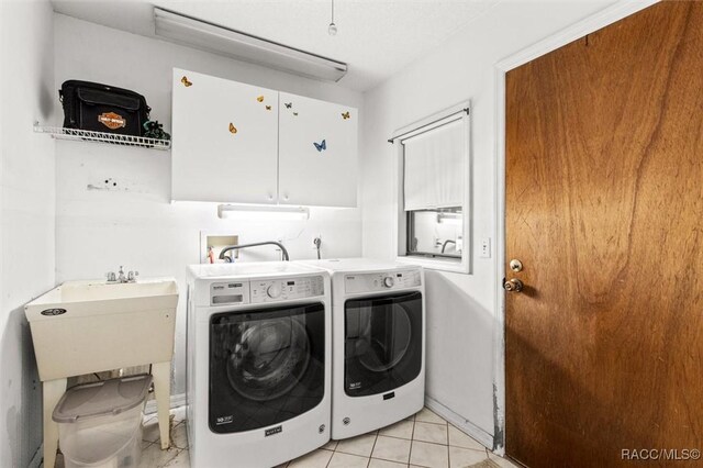 1420 E Silver Thorn Loop, Hernando, FL 34442 - laundry room featuring cabinet space, independent washer and dryer, and light tile patterned flooring