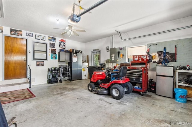 1420 E Silver Thorn Loop, Hernando, FL 34442 - garage featuring freestanding refrigerator, a garage door opener, electric panel, and ceiling fan