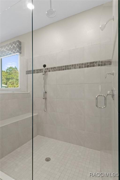 bathroom with walk in shower