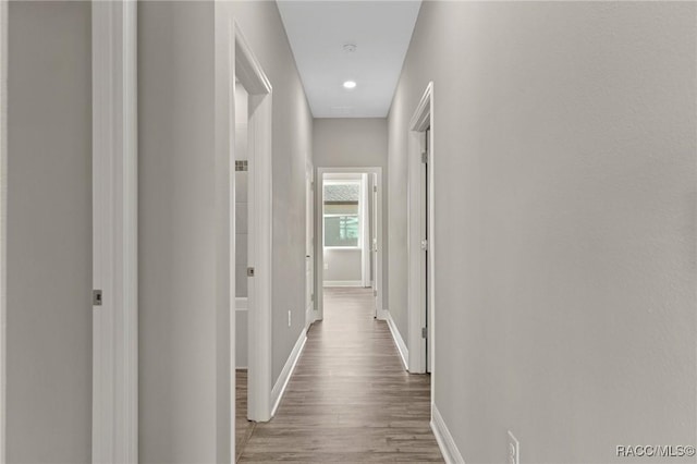 hall featuring hardwood / wood-style floors