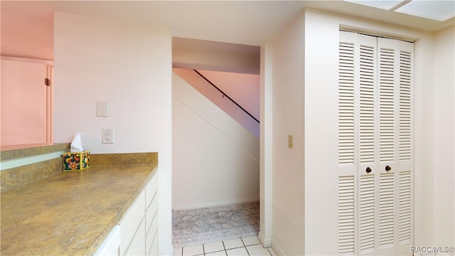 bathroom featuring tile patterned flooring