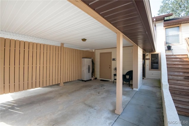 view of patio featuring a carport