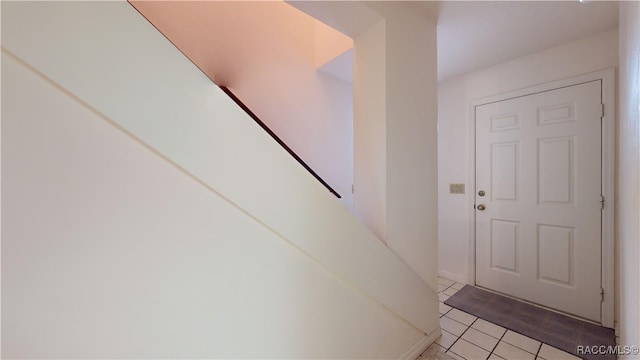 interior space with light tile patterned floors