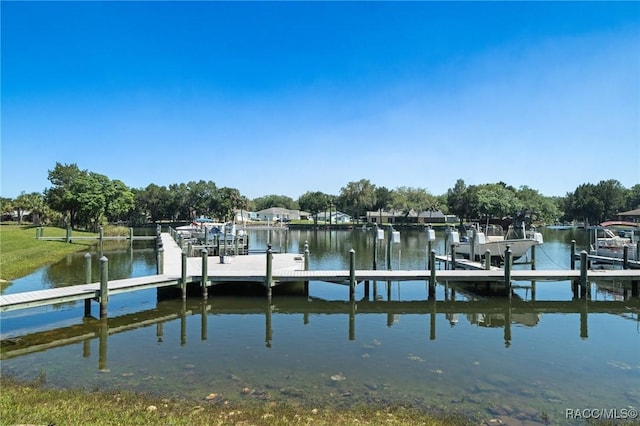 view of dock featuring boat lift and a water view