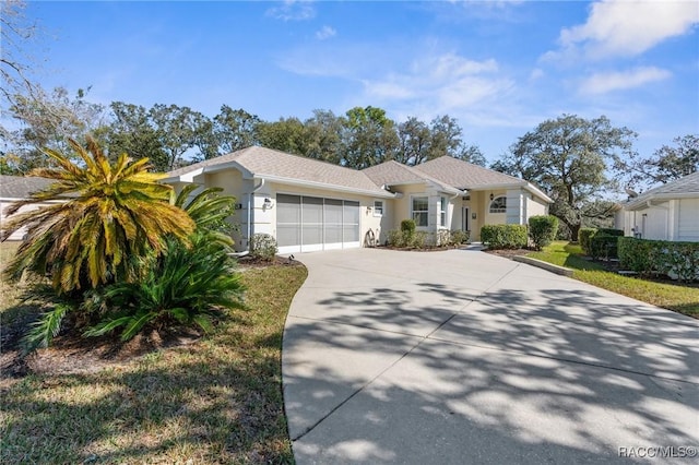 ranch-style home featuring a garage