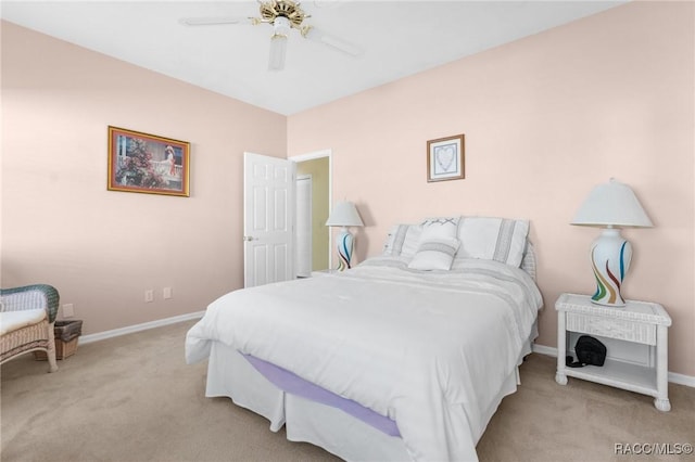 bedroom featuring ceiling fan and light colored carpet