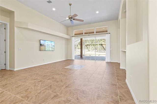 spare room with ceiling fan