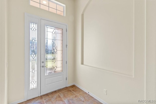 entrance foyer featuring a healthy amount of sunlight