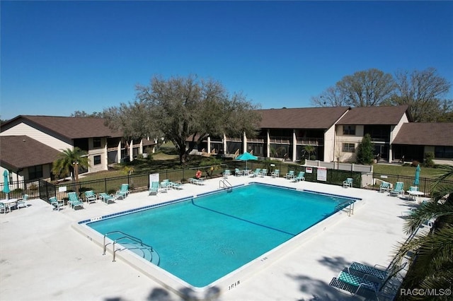 view of pool featuring a patio area