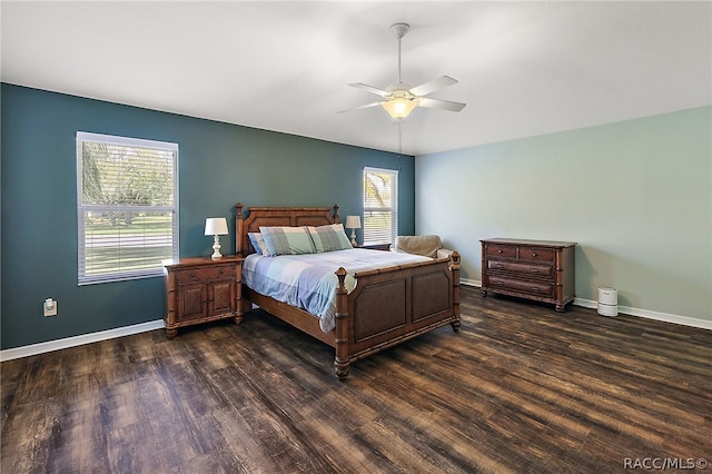 bedroom featuring ceiling fan and dark wood-type flooring