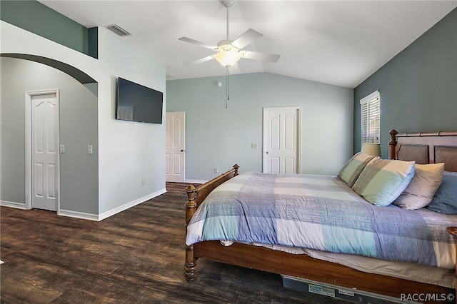 bedroom with vaulted ceiling, ceiling fan, and dark hardwood / wood-style floors