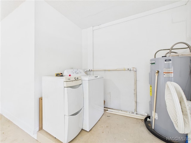 laundry area featuring water heater and washing machine and clothes dryer