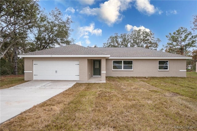 ranch-style house with a front yard and a garage