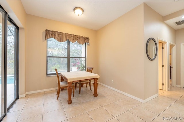 dining room with light tile patterned floors