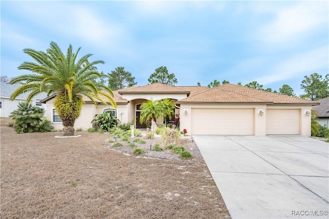 view of front of property with a garage