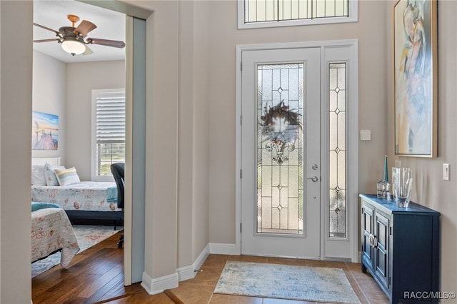 foyer featuring light hardwood / wood-style floors and ceiling fan