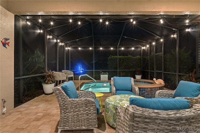 view of patio with a swimming pool with hot tub