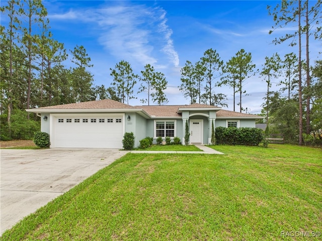 1899 W Oliver Dr, Citrus Springs, FL 34434 - ranch-style home featuring a garage, driveway, stucco siding, and a front lawn