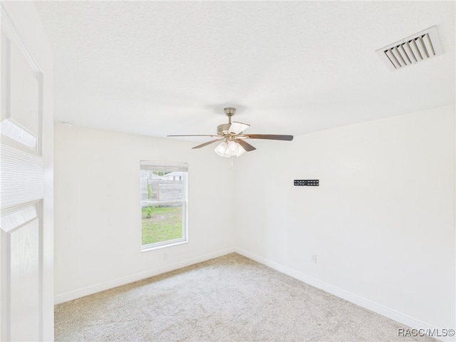 1899 W Oliver Dr, Citrus Springs, FL 34434 - spare room featuring carpet floors and ceiling fan