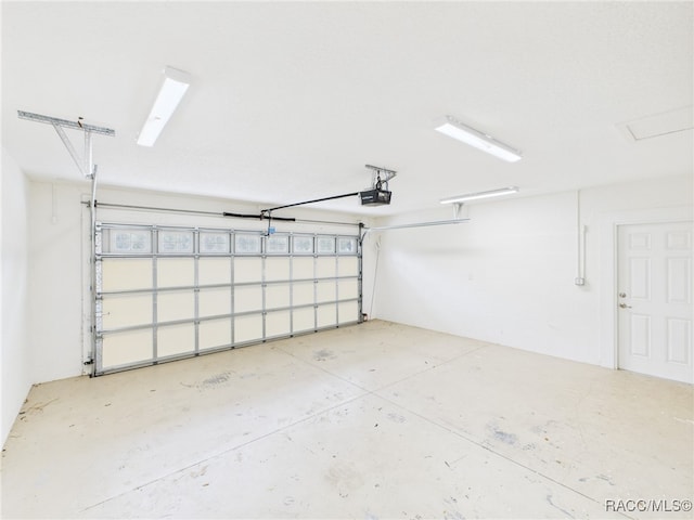 1899 W Oliver Dr, Citrus Springs, FL 34434 - garage with a garage door opener