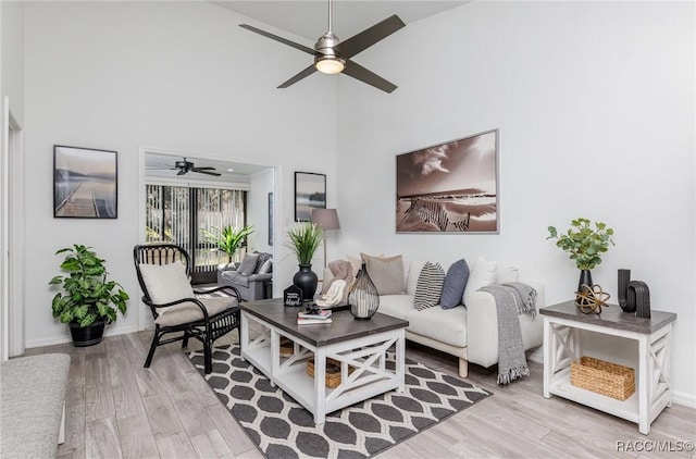 340 E Glassboro Ct Unit 19-5A, Hernando, FL 34442 - living area featuring ceiling fan, wood finished floors, and high vaulted ceiling