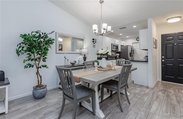 340 E Glassboro Ct Unit 19-5A, Hernando, FL 34442 - dining space featuring light wood-type flooring, a chandelier, and recessed lighting