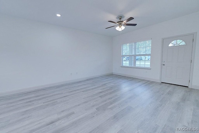 entryway featuring light hardwood / wood-style flooring and ceiling fan