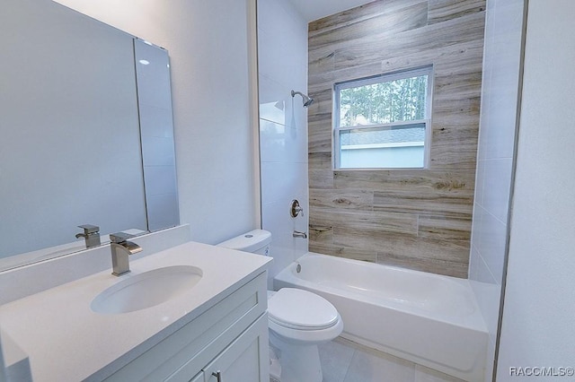 full bathroom with tile patterned floors, tiled shower / bath combo, toilet, and vanity