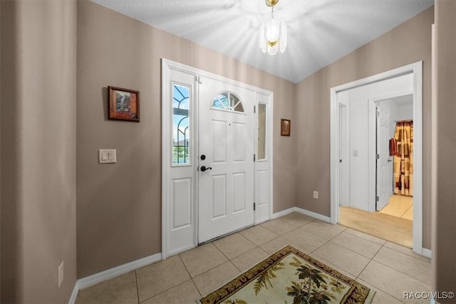 15776 SW 11th Terrace Rd, Ocala, FL 34473 - foyer with light tile patterned floors and baseboards