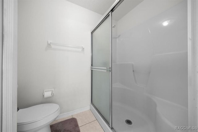 15776 SW 11th Terrace Rd, Ocala, FL 34473 - bathroom featuring an enclosed shower and tile patterned floors