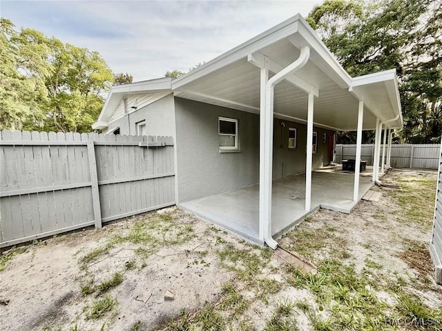 657 NE 11th St, Crystal River, FL 34428 - view of outbuilding with a fenced backyard