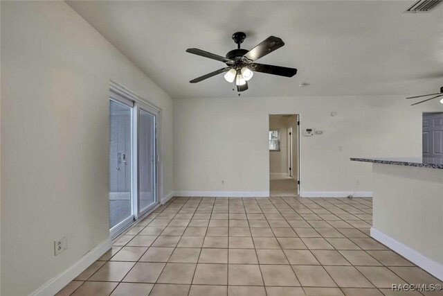 657 NE 11th St, Crystal River, FL 34428 - unfurnished room featuring ceiling fan and baseboards