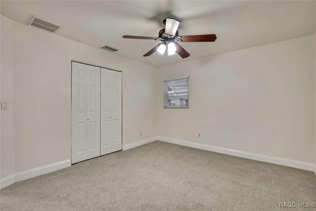 657 NE 11th St, Crystal River, FL 34428 - unfurnished bedroom featuring carpet and baseboards