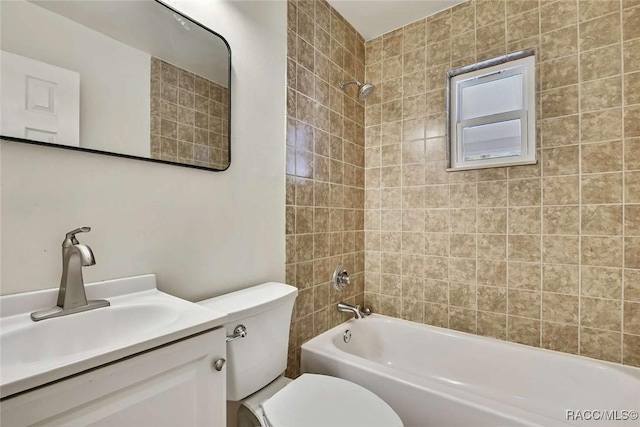 657 NE 11th St, Crystal River, FL 34428 - bathroom featuring toilet,  shower combination, and vanity