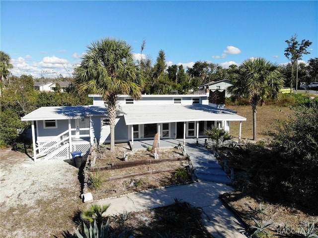 view of front of house with a patio area