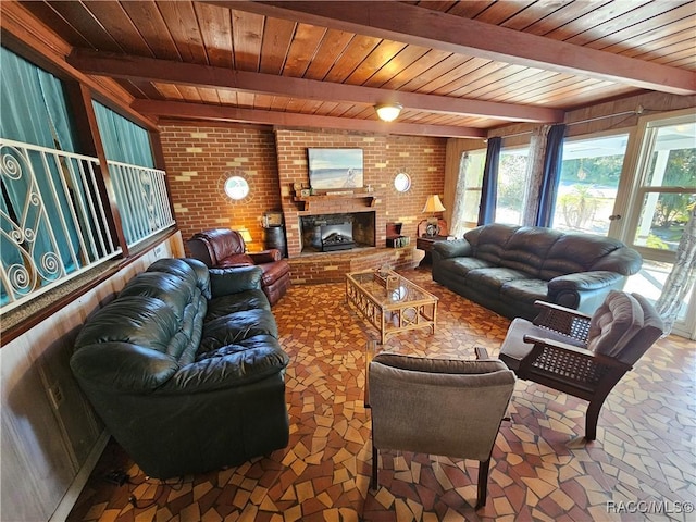 living room featuring beam ceiling, wood ceiling, and brick wall