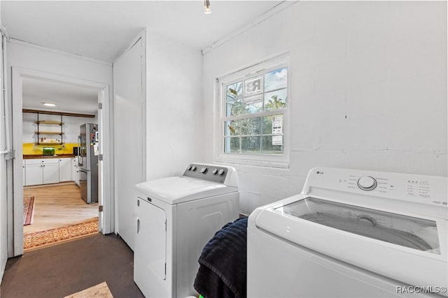 laundry room with washer and dryer